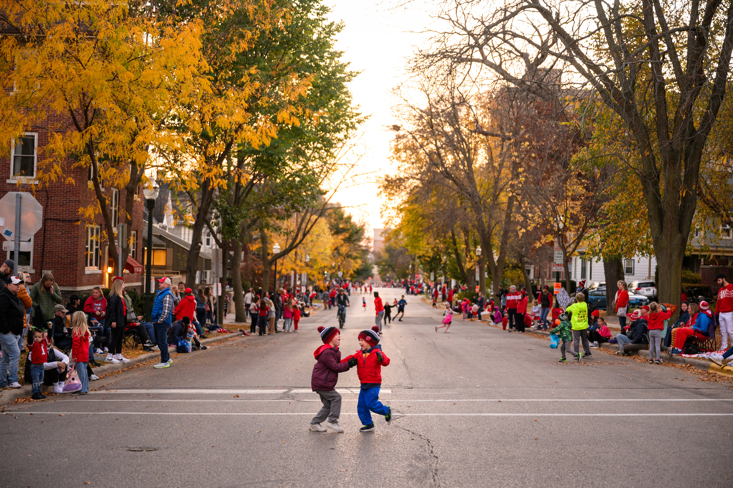 Children wearing Univeristy of Wisconsin-Madison clothing at a parade
