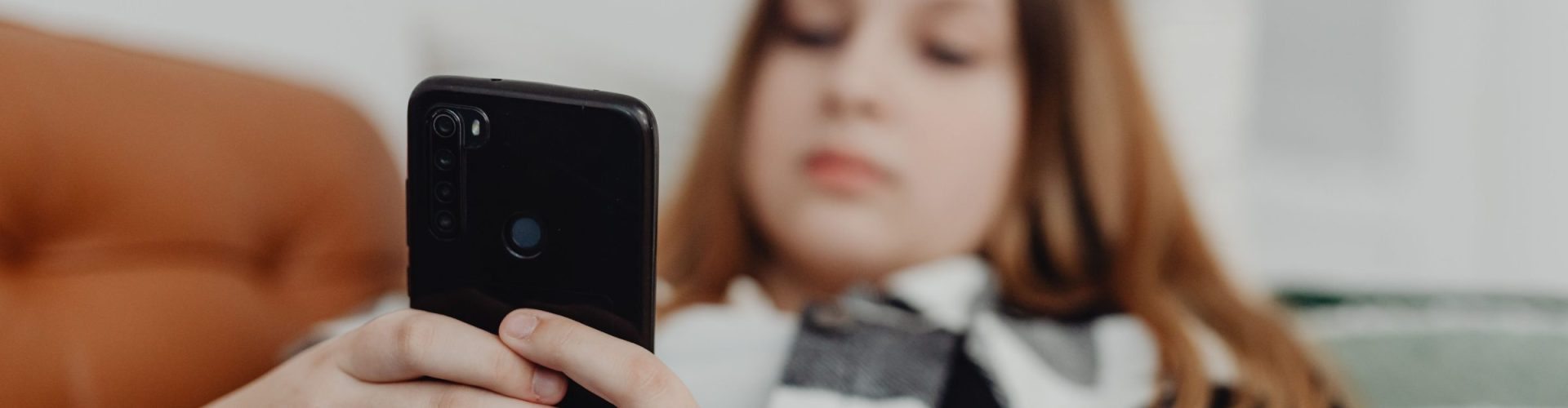 Teen girl using smart phone